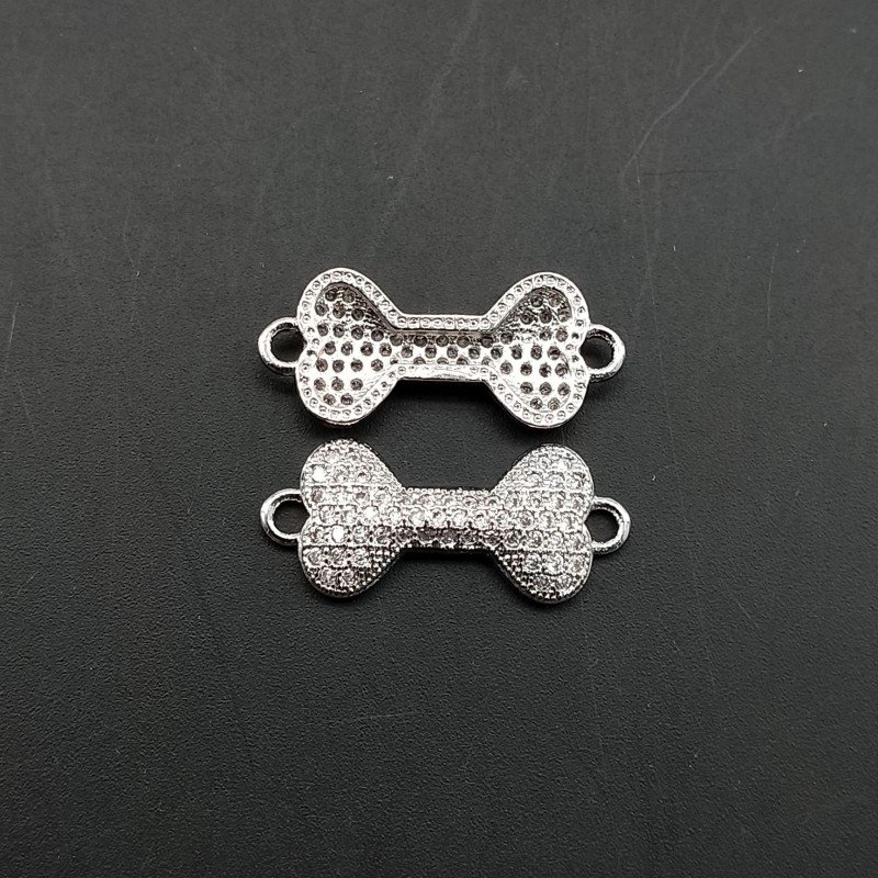 Componenti Di Ottone Con Zirconi Osso 09x16mm Rodiato 1pz