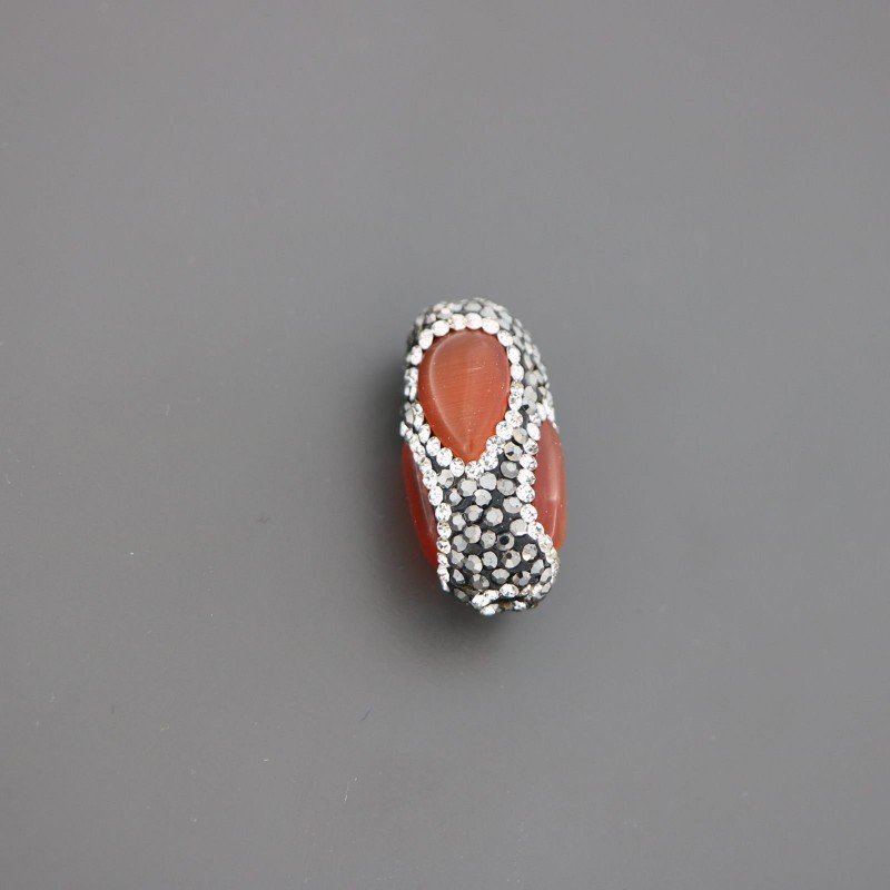 Marcasite Cilindro con occhio di gatto arancio 15x28mm 1pz