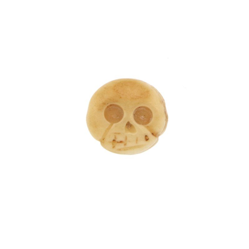Componente osso beige tondo piatto con inciso teschio 12 mm 1pz