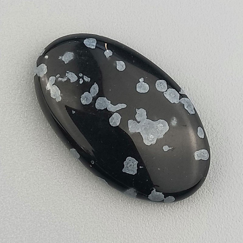 Ossidiana Fiocco Di Neve Naturale Forma Ovale Piatto Cabochon Liscio Fatto a Mano 23X13X5mm 11,45 Carati 1pz