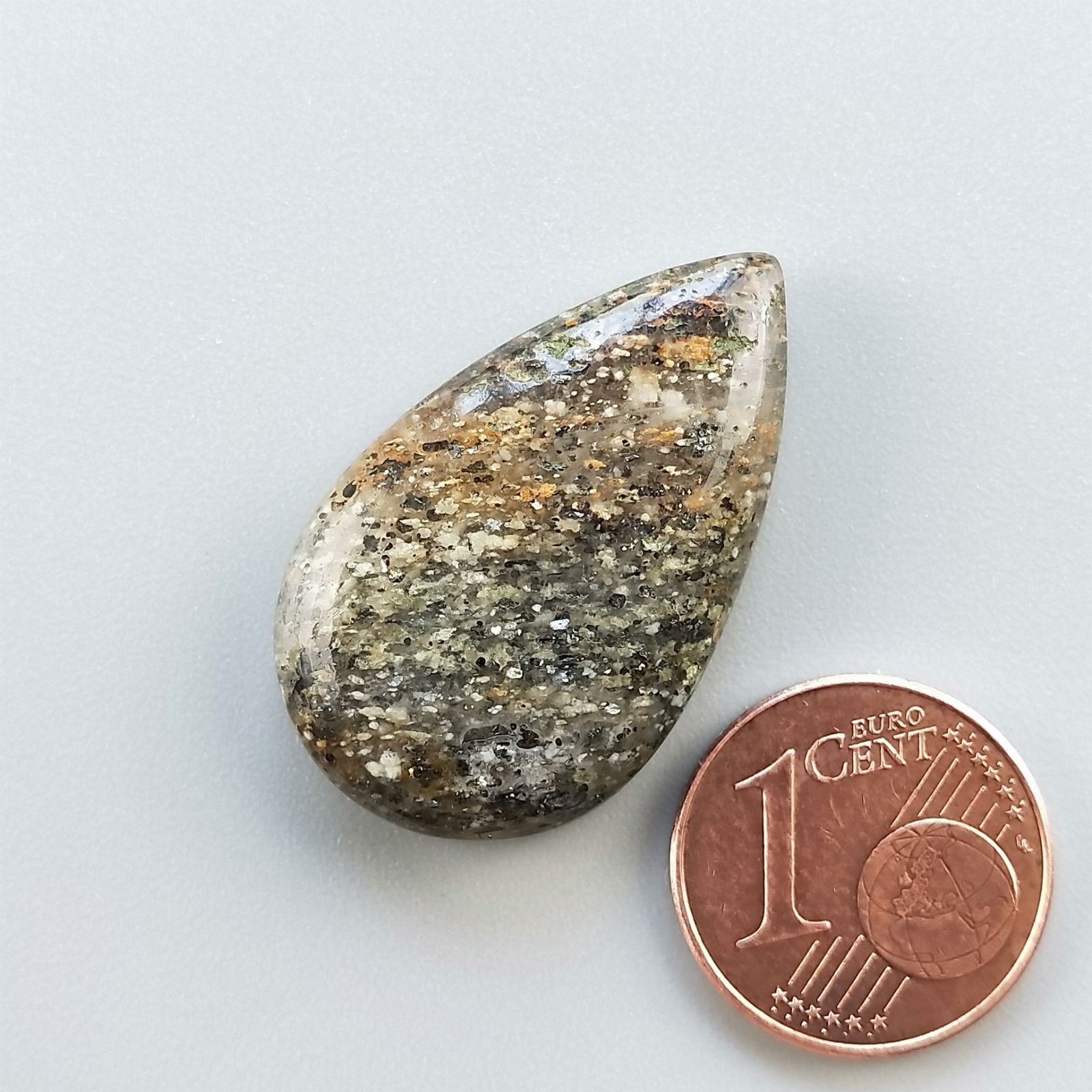 Pietra di Sole Nera Naturale Forma Goccia Piatto Cabochon Liscio Fatto a Mano 29X18X6mm 5.50gm 1pz