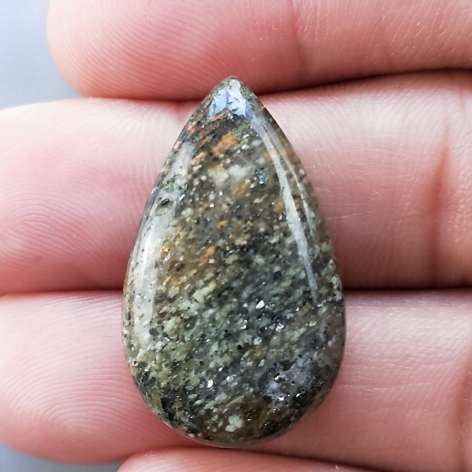 Pietra di Sole Nera Naturale Forma Goccia Piatto Cabochon Liscio Fatto a Mano 29X18X6mm 5.50gm 1pz