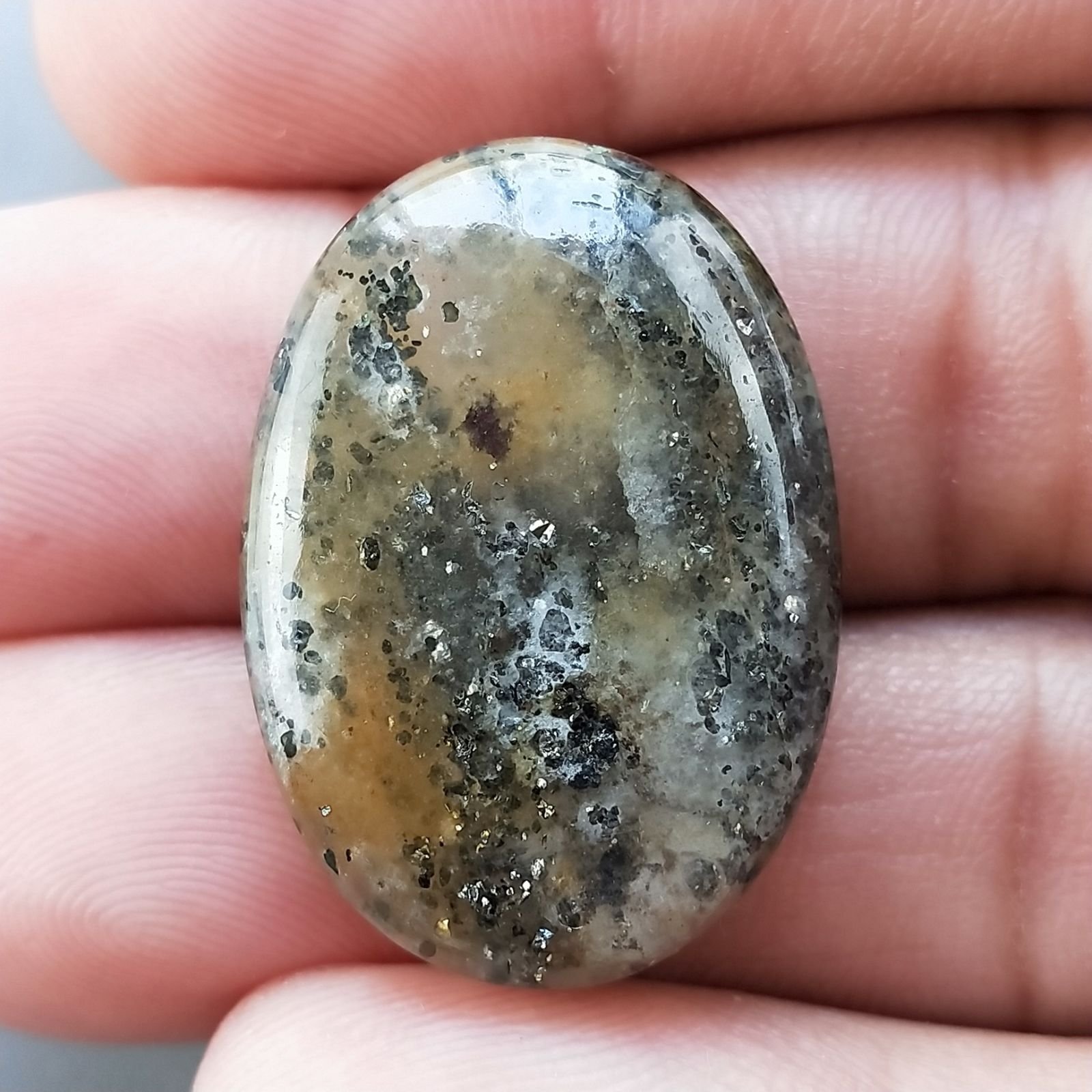Pietra di Sole Nera Naturale Forma Ovale Piatto Cabochon Liscio Fatto a Mano 29X21X7mm 7,40gm 1pz