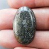 Pietra di Sole Nera Naturale Forma Ovale Piatto Cabochon Liscio Fatto a Mano 29X17X6mm 5,68gm 1pz