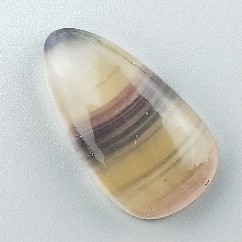 Fluorite Naturale Forma Goccia Piatto Cabochon Liscio Fatto a Mano 28X15X6mm 6,00gm 1pz