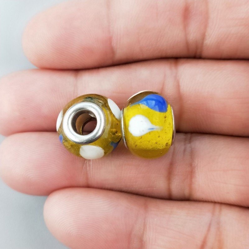 Perlina foro largo giallo trasparente con stampa blu e bianca 13.5x8.5mm 1pz