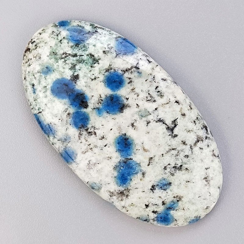 K2 'Raindrop Azurite' Naturale Forma Ovale Piatto Cabochon Liscio Fatto a Mano 53x29mm 16,14gm 1pz