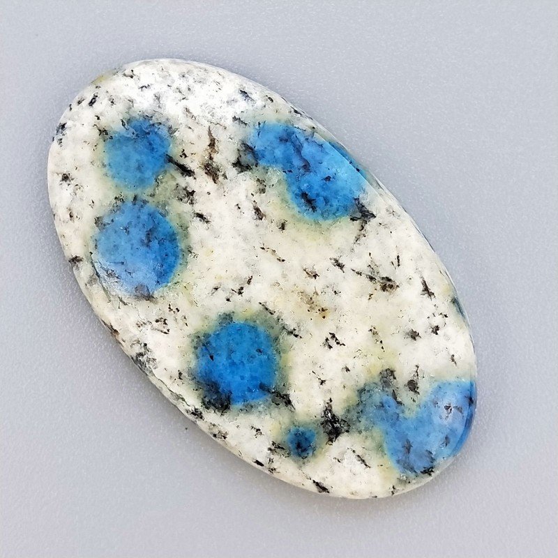 K2 'Raindrop Azurite' Naturale Forma Ovale Piatto Cabochon Liscio Fatto a Mano 41X24mm 9,95gm 1pz