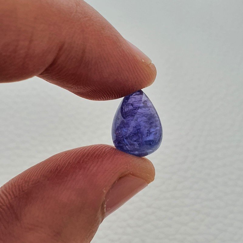 Tanzanite Naturale Forma Goccia Piatto Cabochon Liscio Fatto a Mano 13X9X7mm 8,15 Carati 1pz Tanzanite Naturale Forma Goccia Piatto Cabochon Liscio Fatto a Mano 13X9X7mm 8,15 Carati 1pz