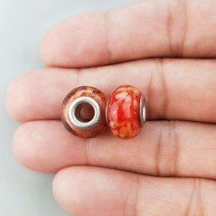Perlina foro largo rosso con macchie beige su di esso 13.5x8.5mm 1pz