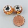 Perlina foro largo dorato con macchie bionde 13.5x8.5mm 1pz