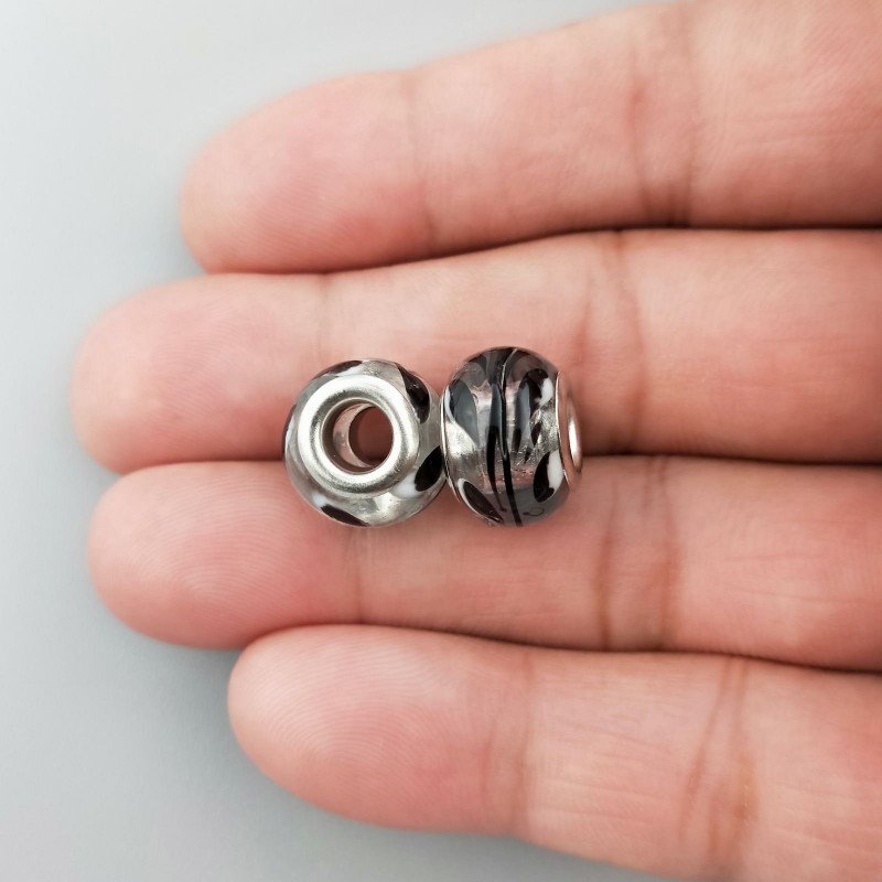Perlina foro largo arte in bianco e nero su pietra trasparente 13.5x8.5mm 1pz