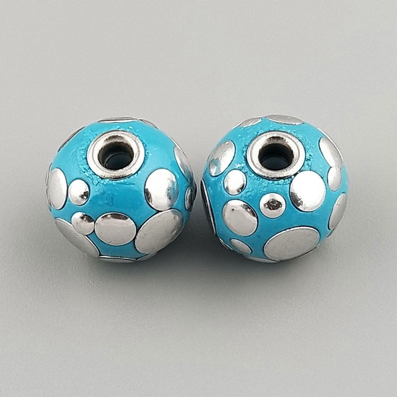 Perlina foro largo azzurro pallido con cerchi d'argento su di esso 13.5x8.5mm 1pz