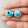 Perlina foro largo azzurro pallido con cerchi d'argento su di esso 13.5x8.5mm 1pz