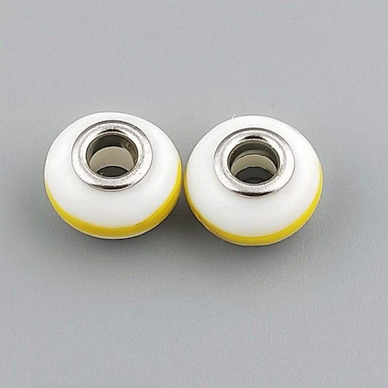 Perlina foro largo giallo e bianco13.5x8.5mm 1pz Perlina foro largo giallo e bianco13.5x8.5mm 1pz