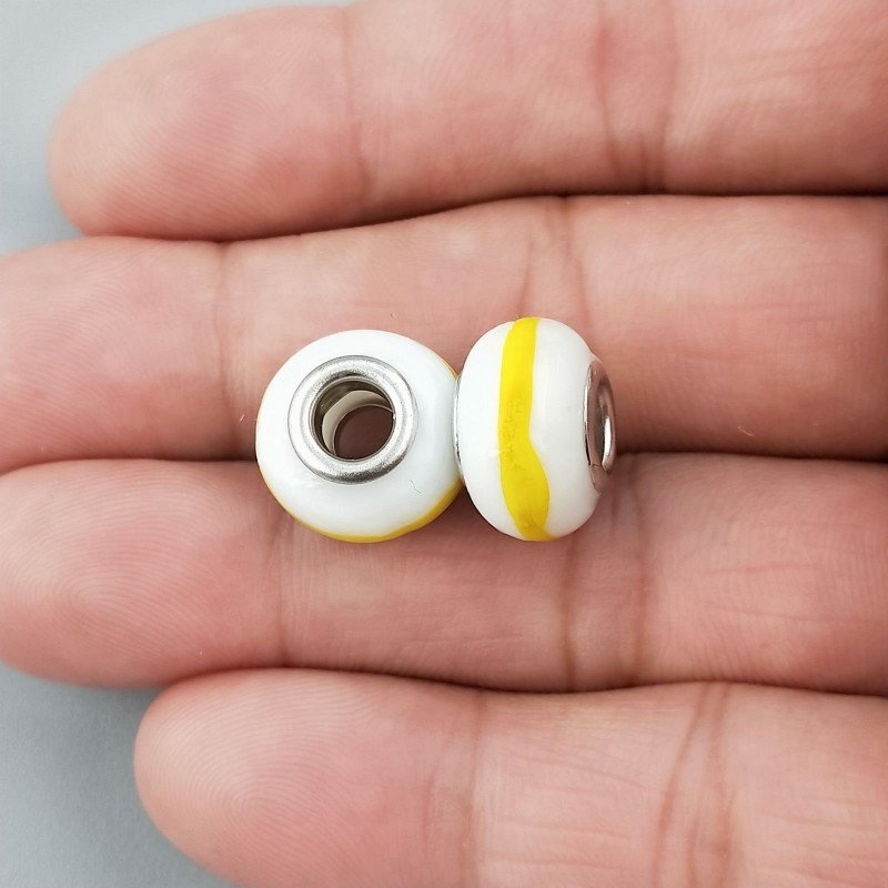 Perlina foro largo giallo e bianco13.5x8.5mm 1pz Perlina foro largo giallo e bianco13.5x8.5mm 1pz
