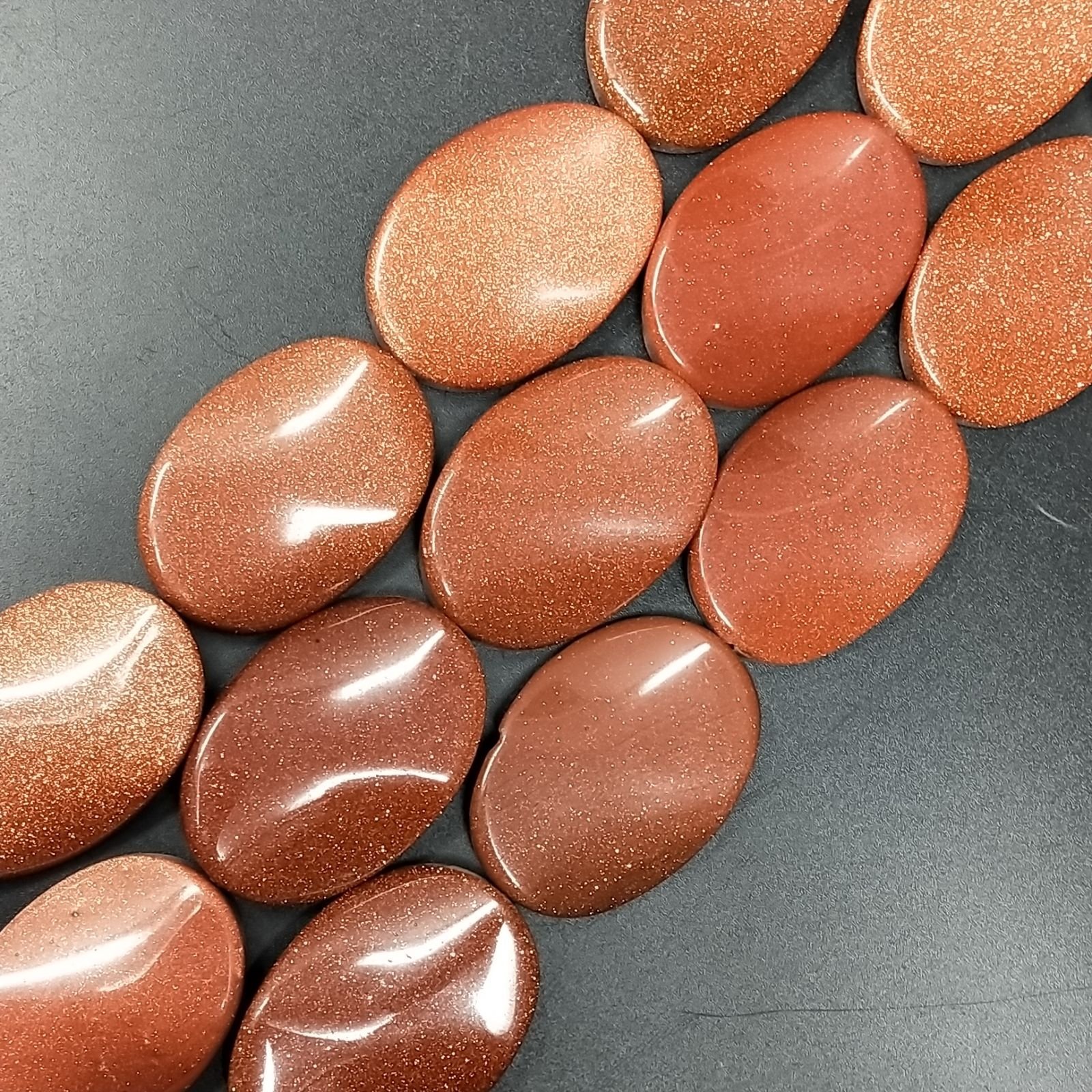 Pasta di Pietra del Sole in Perline Forma Ovale Elicoidale Liscio Foro Passante 25X35mm