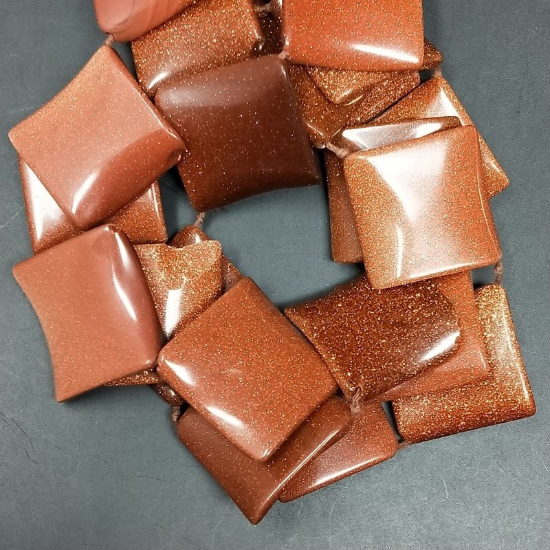 Pasta di Pietra Del Sole in Perline Forma Rombo Piatto Elicoidale Liscio Foro Diagonale 38mm
