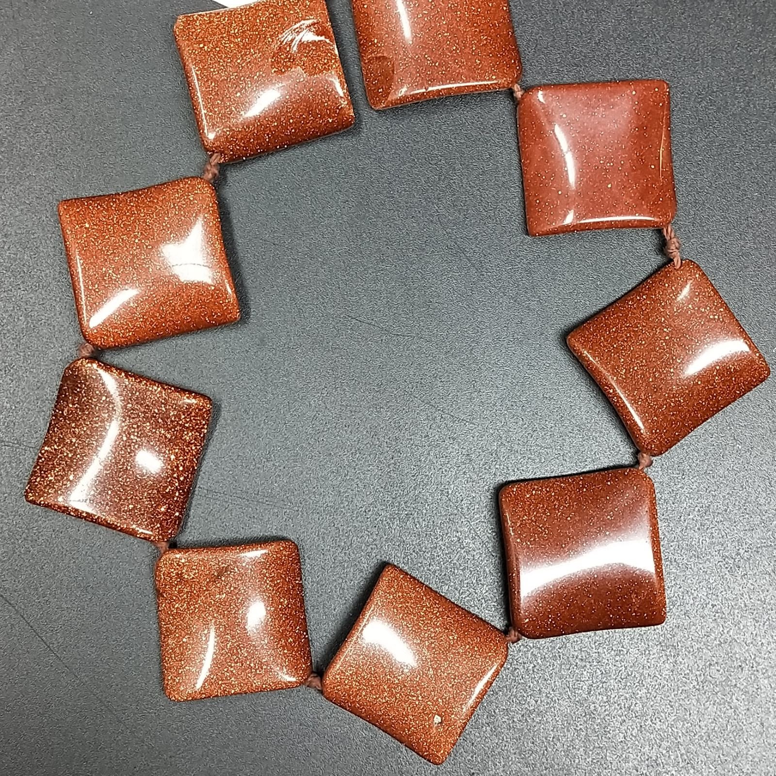 Pasta di Pietra Del Sole in Perline Forma Rombo Piatto Elicoidale Liscio Foro Diagonale 28mm