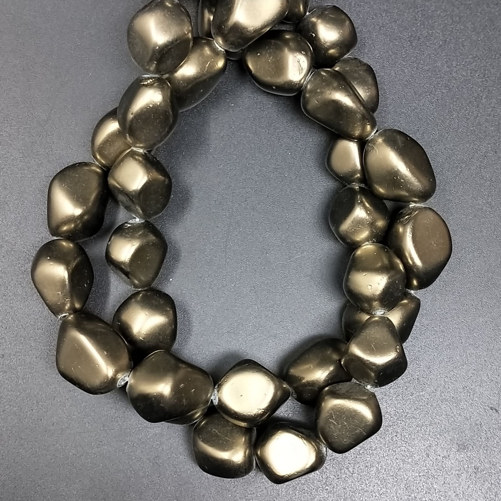 Perle di maiorca bronzo metallizzato sassi lisci