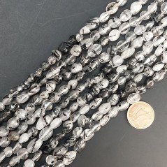 Quarzo rutilato sassi lisci