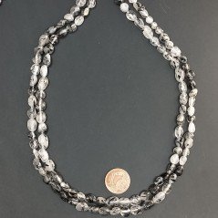 Quarzo rutilato sassi lisci