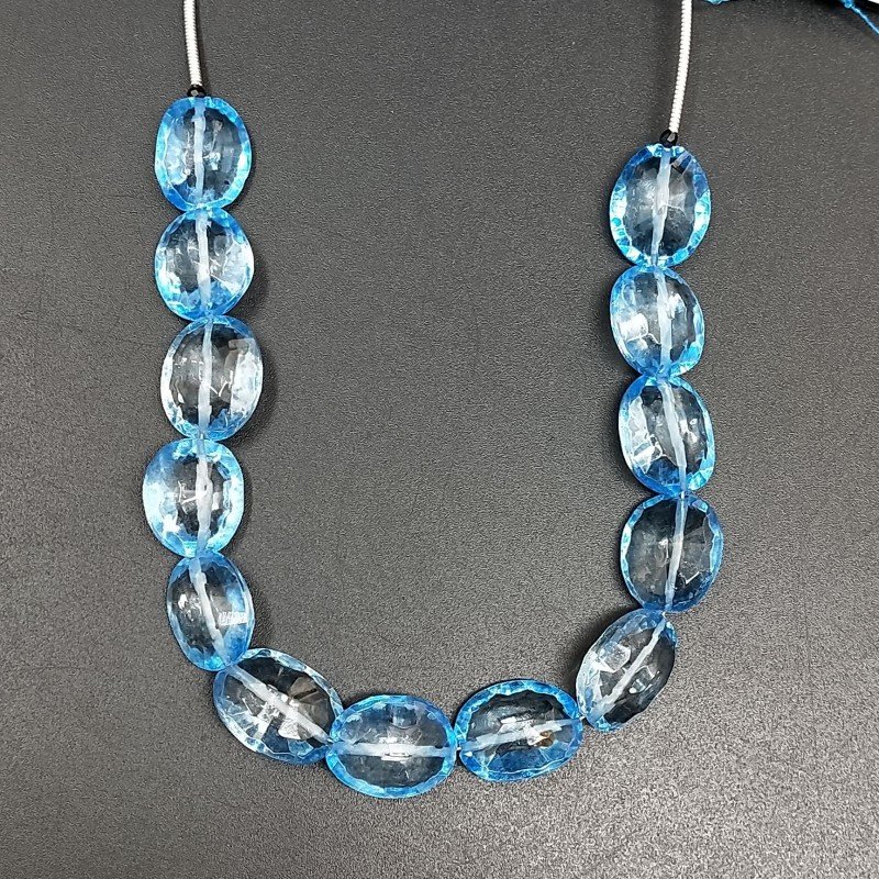 Cristallo di Rocca Rivestito Blu in Perline Forma Ovale Piatto Taglio Concavo Sfaccettato a Mano Foro Passante Cristallo di Rocca Rivestito Blu in Perline Forma Ovale Piatto Taglio Concavo Sfaccettato a Mano Foro Passante