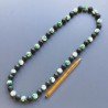 Collana pietra lavica sferica con resina ambra verde sferico 15mm annodato