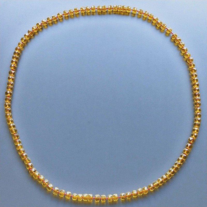 Collana cristallo ambrato rondelle sfac 10mm annodato