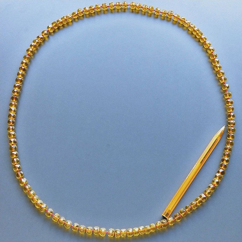Collana cristallo ambrato rondelle sfac 10mm annodato
