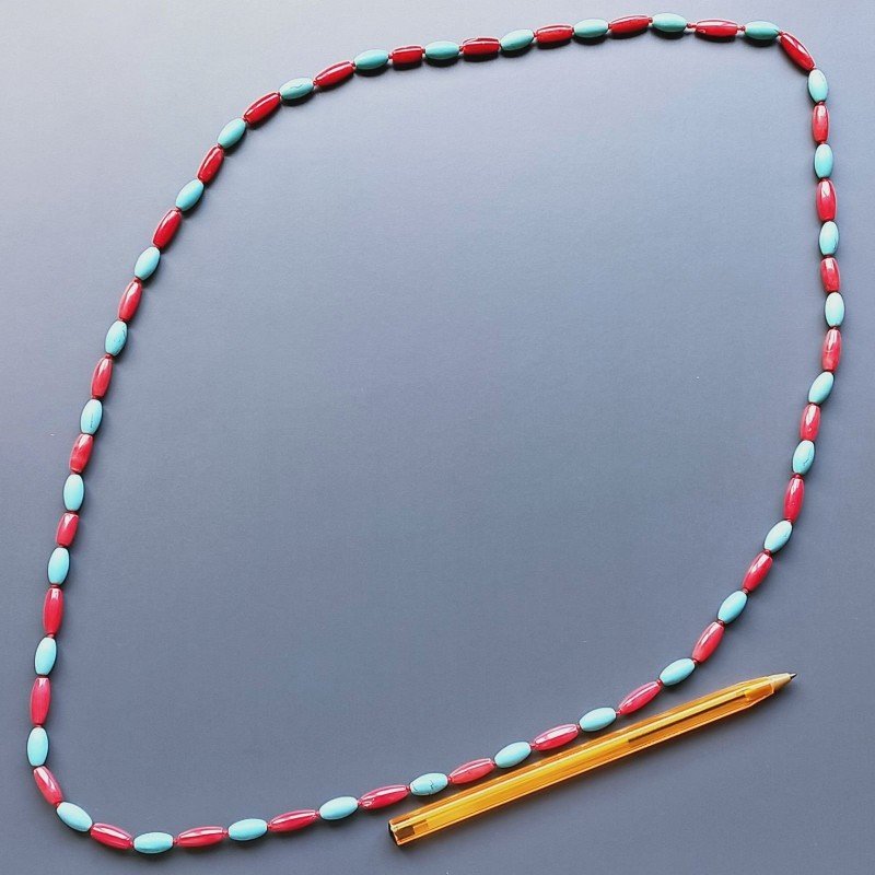 Collana pasta di turchese ovale liscio 6x12 e corallo di bamboo gocce liscio 5x14 mm annodato