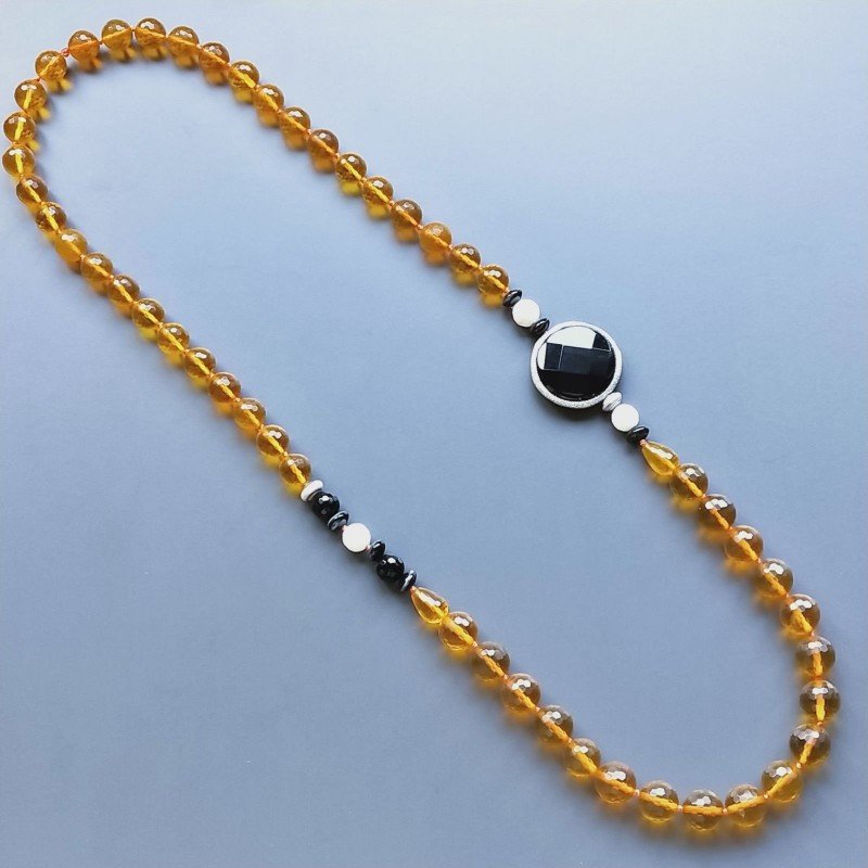 Collana cristallo ambra sferico sfac 12 mm occe sfacc 10x14 mme con pietre dure miste annodato