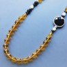 Collana cristallo ambra sferico sfac 12 mm occe sfacc 10x14 mme con pietre dure miste annodato