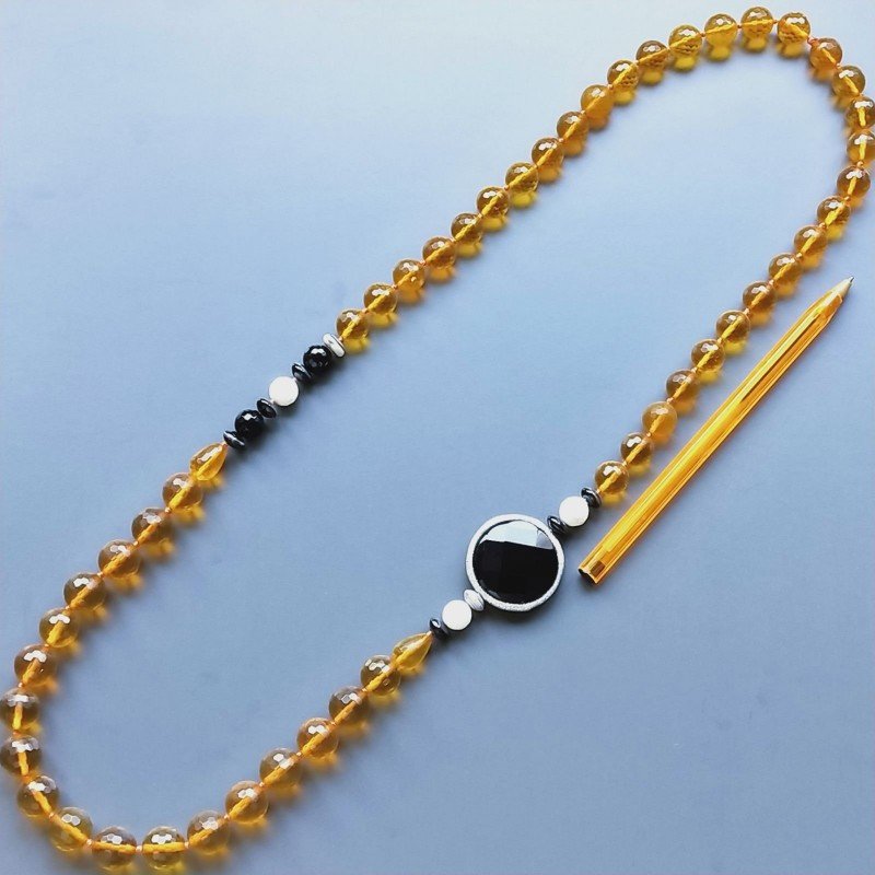 Collana cristallo ambra sferico sfac 12 mm occe sfacc 10x14 mme con pietre dure miste annodato