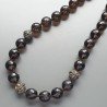 Collana girocollo cristallo fume sferico sfac 16-18 mm con ottone argentato lavorato e cristallo viola moneta sfac annodato