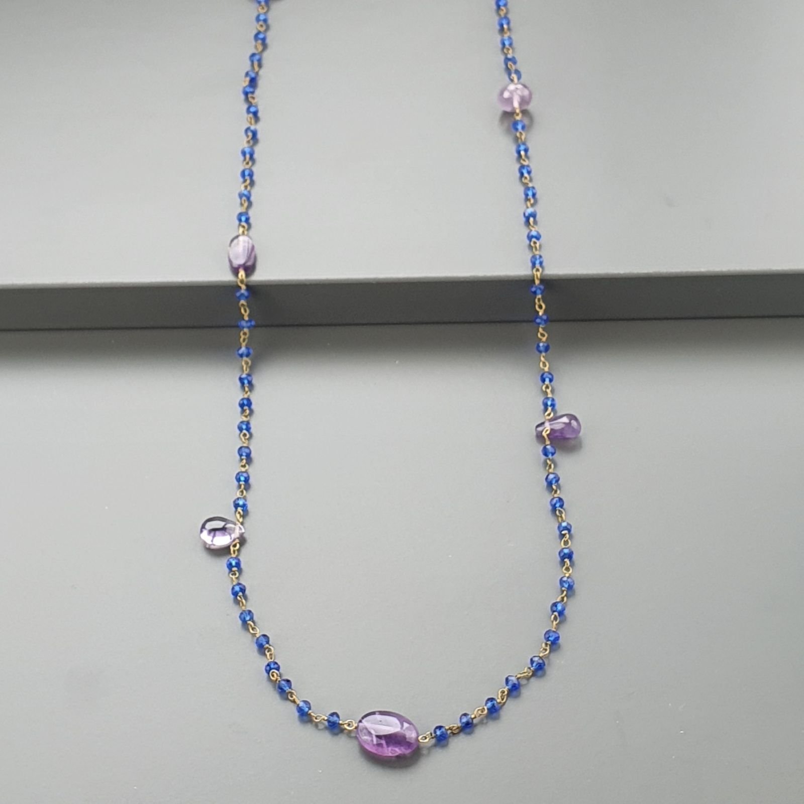 Collana A Nodo Orafo Dorato Con Cristallo Blu E Ametista