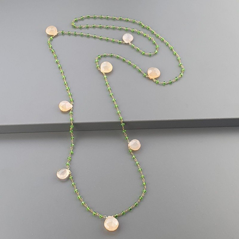 Collana A Nodo Orafo Rosato Con Cristallo Verde E Calcedonio