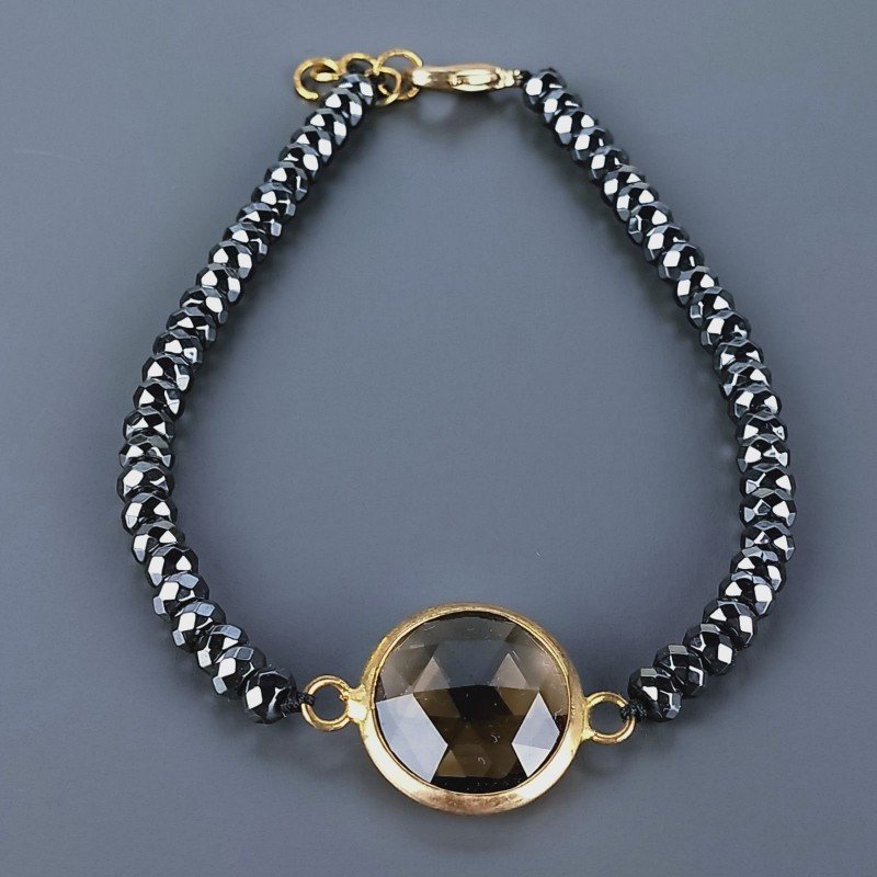 Bracciale di Ematite Rondelle Sfaccettato 04mm con Centrale di Onice Nera e Ottone