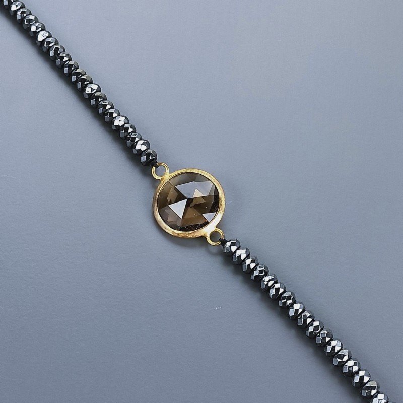 Bracciale di Ematite Rondelle Sfaccettato 04mm con Centrale di Onice Nera e Ottone