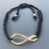 Bracciale Intrecciato con Centrale in Ottone Dorato a Forma Infinito e Chiusura Sali e Scendi