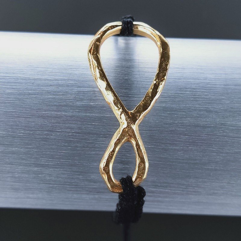 Bracciale Intrecciato con Centrale in Ottone Dorato a Forma Infinito e Chiusura Sali e Scendi