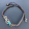 Bracciale Intrecciato con Centrale di Pasta di Turchese in Ottone Dorato e Chiusura Sali e Scendi