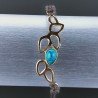 Bracciale Intrecciato con Centrale di Pasta di Turchese in Ottone Dorato e Chiusura Sali e Scendi