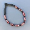 Collana girocollo di seta indiana nera con riso vetro di murano rosso lavorato linee