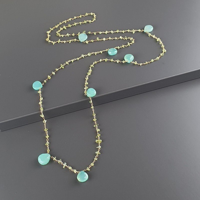 Collana A Nodo Orafo Dorato Con Peridoto E Calcedonio Collana A Nodo Orafo Dorato Con Peridoto E Calcedonio