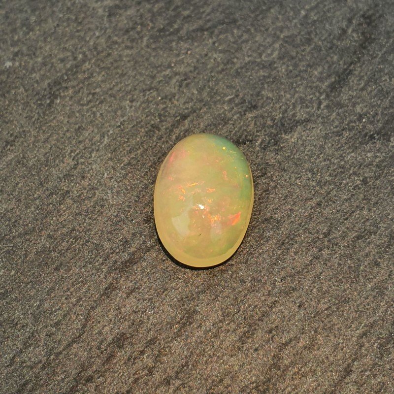 Opale Etiope 'Welo' Naturale Forma Ovale Piatto Cabochon Liscio Fatto a Mano 7,6X10,6X4,5mm 1.70 Carati 1pz Opale Etiope 'Welo' Naturale Forma Ovale Piatto Cabochon Liscio Fatto a Mano 7,6X10,6X4,5mm 1.70 Carati 1pz