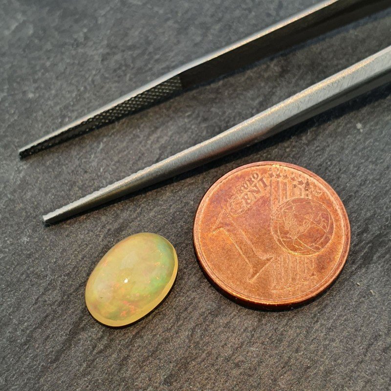 Opale Etiope 'Welo' Naturale Forma Ovale Piatto Cabochon Liscio Fatto a Mano 7,6X10,6X4,5mm 1.70 Carati 1pz Opale Etiope 'Welo' Naturale Forma Ovale Piatto Cabochon Liscio Fatto a Mano 7,6X10,6X4,5mm 1.70 Carati 1pz