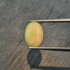 Opale Etiope 'Welo' Naturale Forma Ovale Piatto Cabochon Liscio Fatto a Mano 7,6X10,6X4,5mm 1.70 Carati 1pz Opale Etiope 'Welo' Naturale Forma Ovale Piatto Cabochon Liscio Fatto a Mano 7,6X10,6X4,5mm 1.70 Carati 1pz