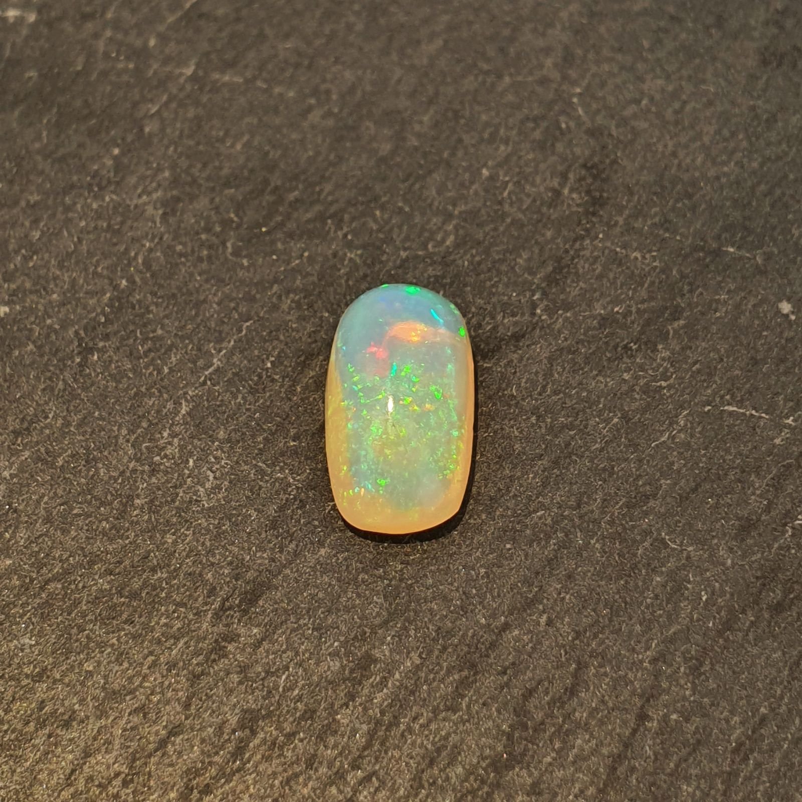 Opale Etiope 'Welo' Naturale Forma Cuscino Piatto Cabochon Liscio Fatto a Mano 7x12x5mm A 2,45 Carati 1pz