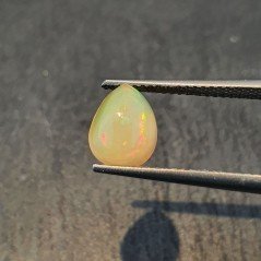 Opale Etiope 'Welo' Naturale Forma Goccia Piatto Cabochon Liscio Fatto a Mano 7x9x4mm 1,20 Carati 1pz